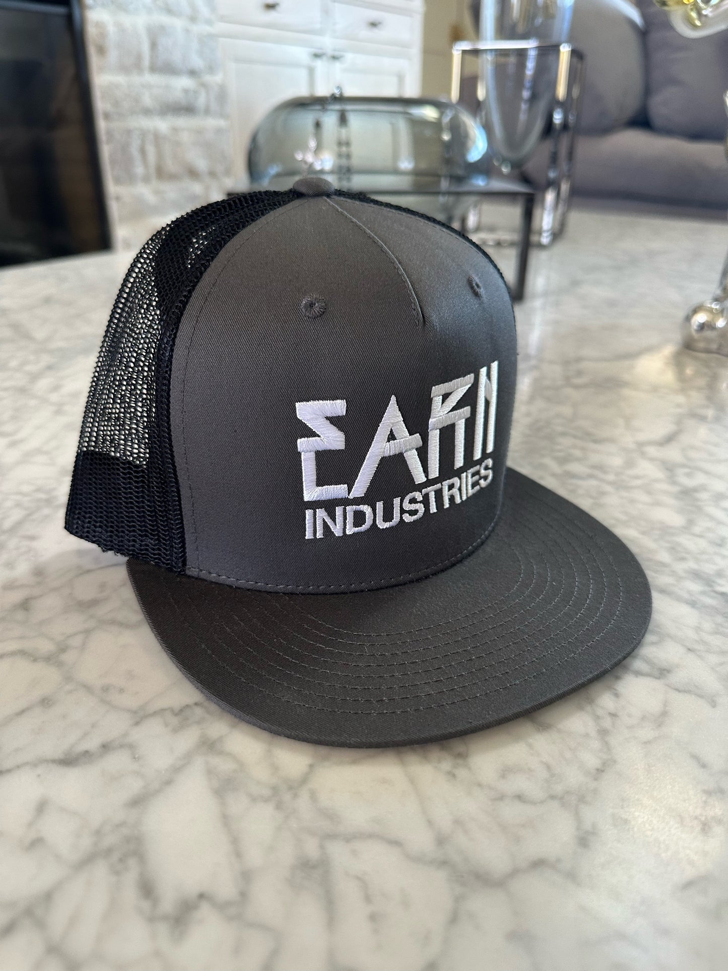 EARN TRUCKER SNAPBACK